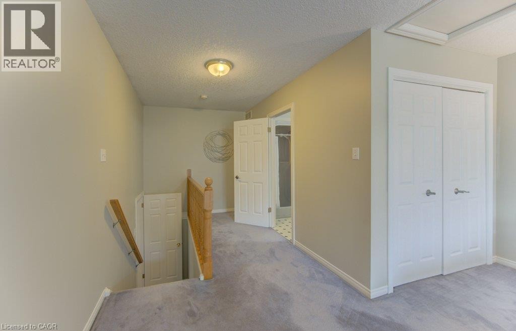 Primary bedroom - up ½ flight of stairs from main level. Vaulted ceiling - 26 Stanmore Avenue, Kitchener, ON