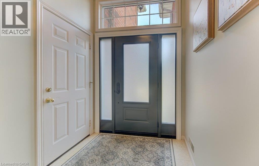 Front door and access to garage - 26 Stanmore Avenue, Kitchener, ON