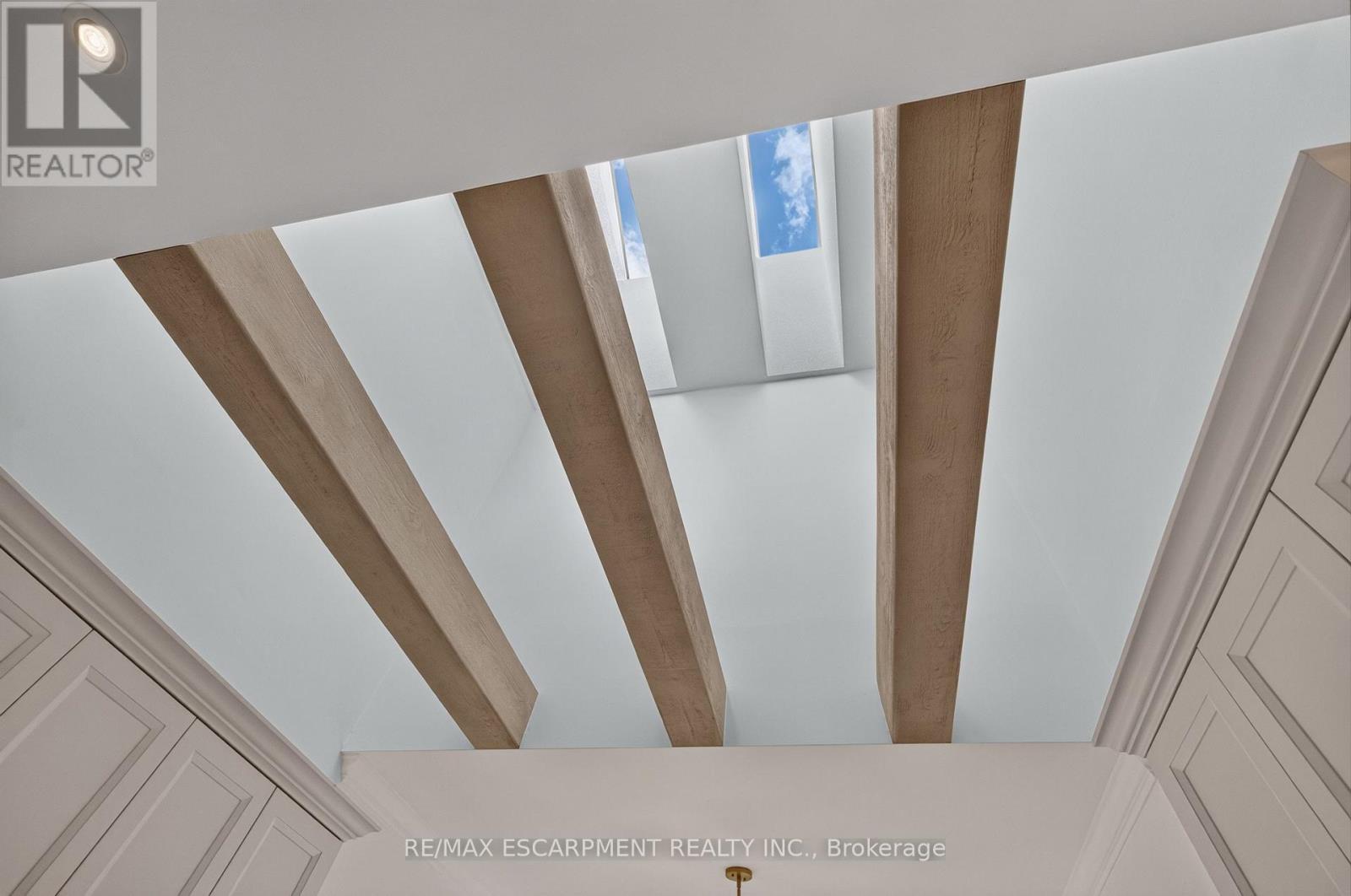 New decor. beams adding some life to the skylights - 112 Fairwood Place W, Burlington, ON