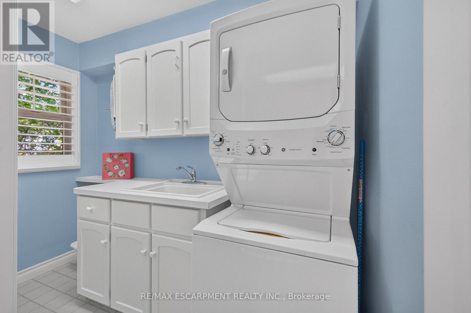 Second floor laundry with a large linen closet - 112 Fairwood Place W, Burlington, ON