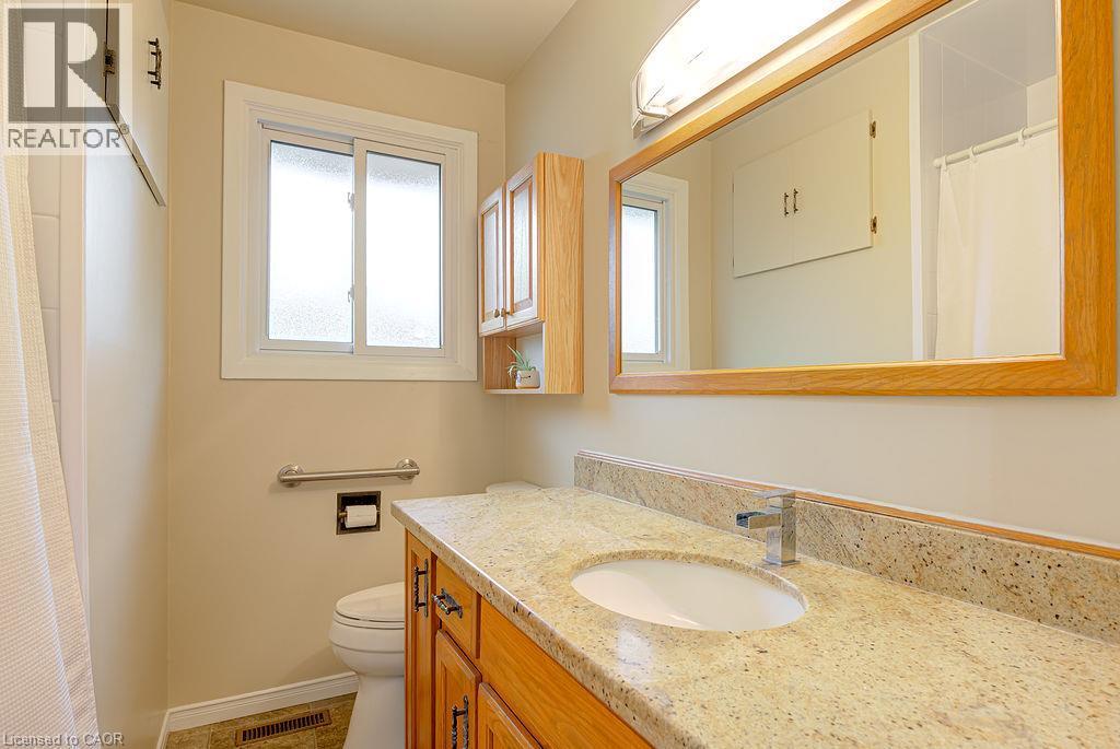 Bathroom featuring a vanity with a built-in sink - 210 Shelley Drive, Kitchener, ON