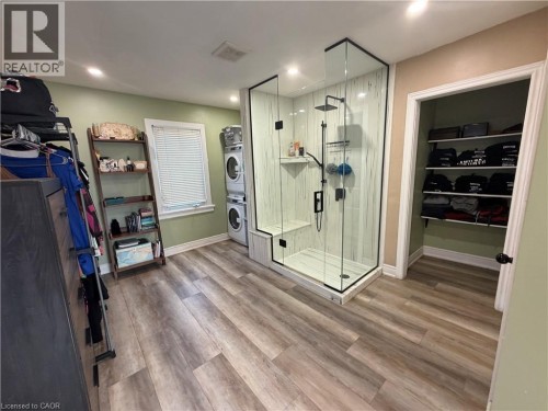 Dressing room with shower, closets and laundry - 94 Howard Avenue, Hamilton, ON 