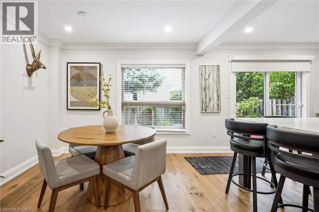 Wood-finish flooring, recessed lighting, and crown molding - 1261 Stephenson Drive, Burlington, ON