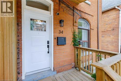 Brick exterior with an arched window - 34 Baillie Street, Hamilton, ON 