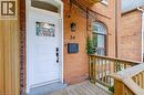 Brick exterior with an arched window - 34 Baillie Street, Hamilton, ON 