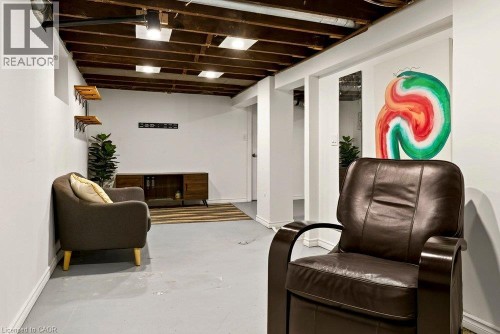 Exposed wood beam ceiling with recessed lighting - 136 Weir Street N, Hamilton, ON 