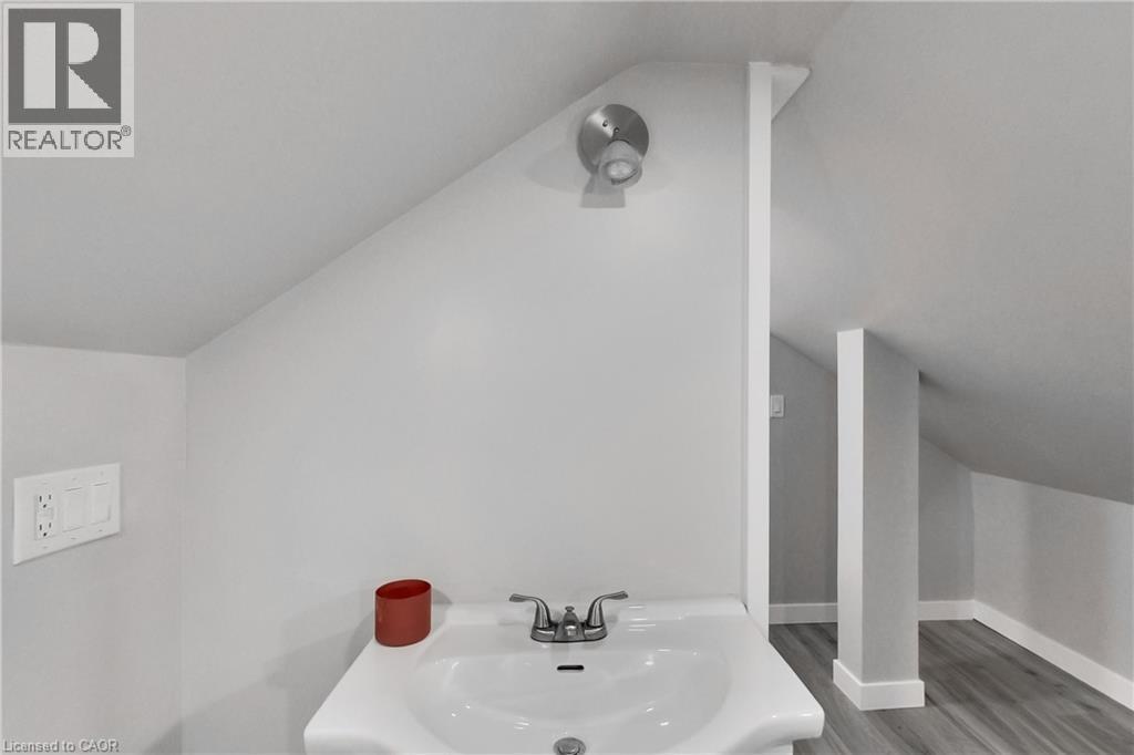 Pedestal sink with chrome-finish faucet - 229 Parkdale Avenue N, Hamilton, ON