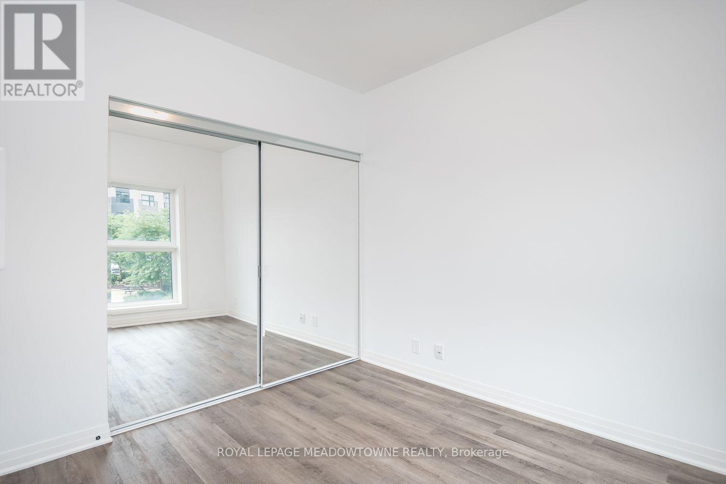 Large double mirrored closet doors - so much room - 205 - 102 Grovewood Common, Oakville, ON
