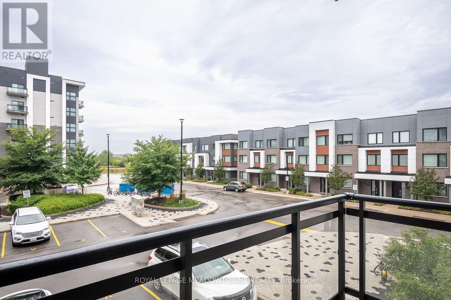 have fun people watching while enjoying a coffee - 205 - 102 Grovewood Common, Oakville, ON