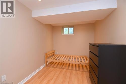 Recessed lighting, wood-finish flooring, and neutral wall tones - 734 King Street W, Hamilton, ON 
