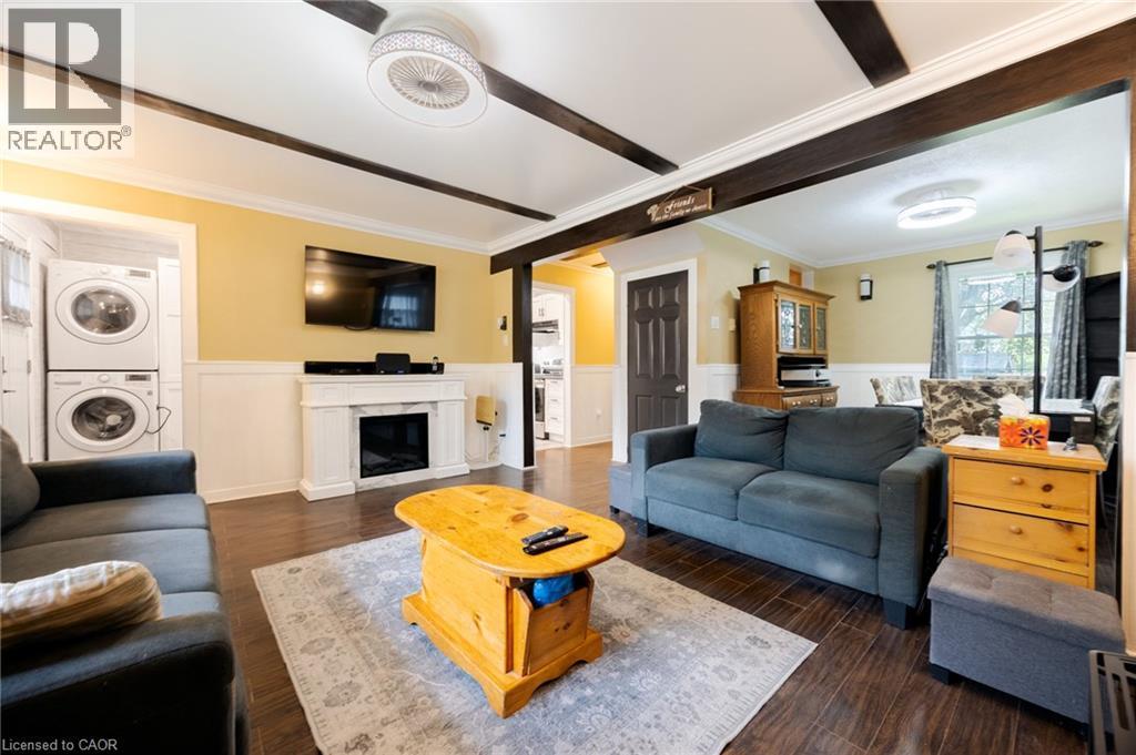 Wood-finish flooring throughout the space - 102 Stewart Avenue, Cambridge, ON