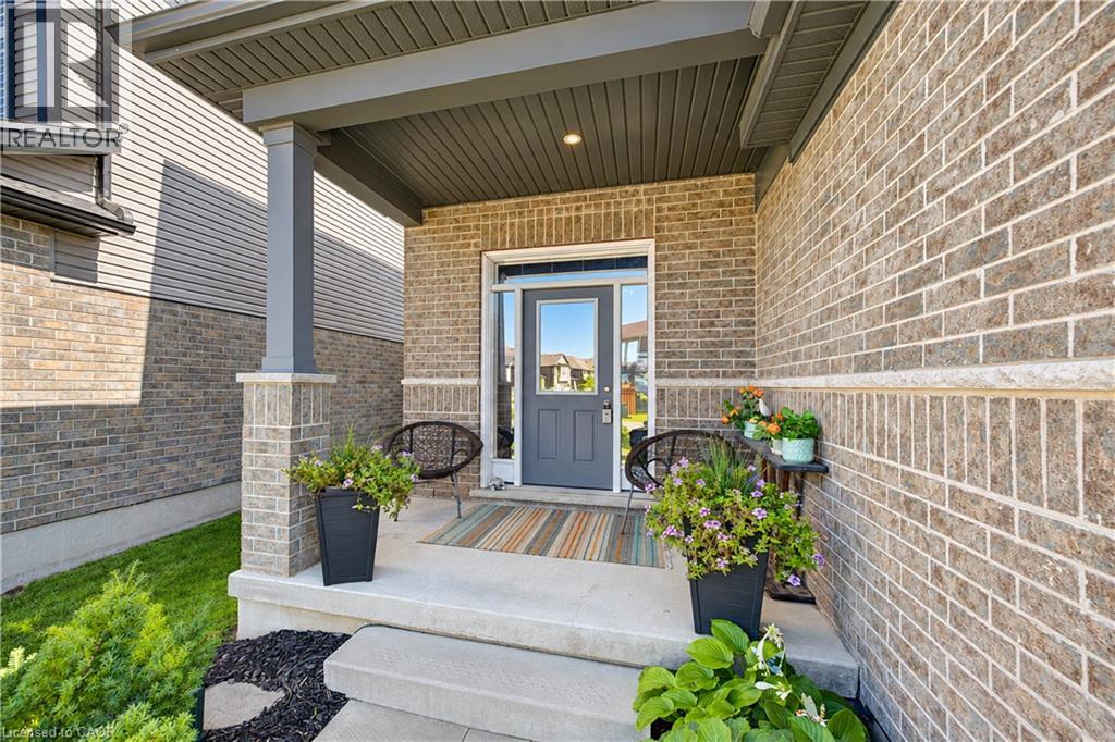 Brick exterior with stone accents and siding - 428 Freure Drive, Cambridge, ON