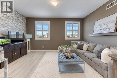 Accent wall featuring stacked stone - 428 Freure Drive, Cambridge, ON 