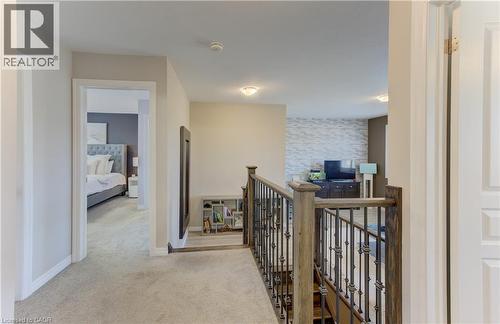 Plush carpeted hallway with recessed lighting - 428 Freure Drive, Cambridge, ON 