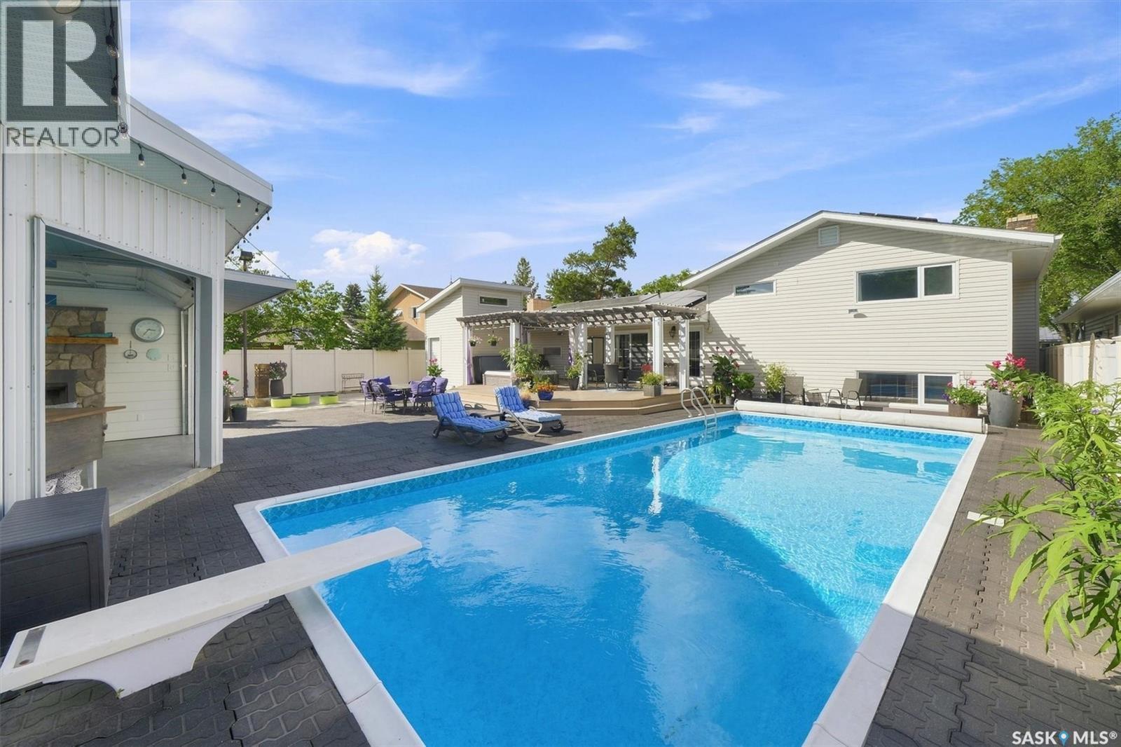 273 Carleton Drive, Saskatoon, SK - Outdoor With In Ground Pool With Deck Patio Veranda With Backyard With Exterior