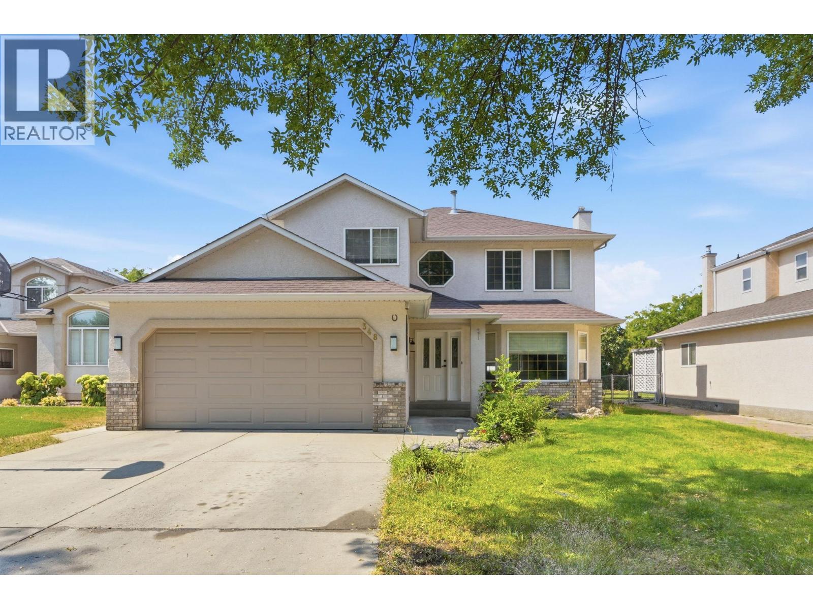 348 Phipps Crescent, Kelowna, BC - Outdoor With Facade