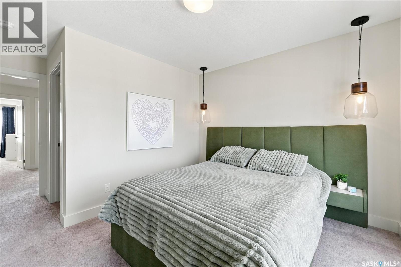 703 Meadows Boulevard, Saskatoon, SK - Indoor Photo Showing Bedroom