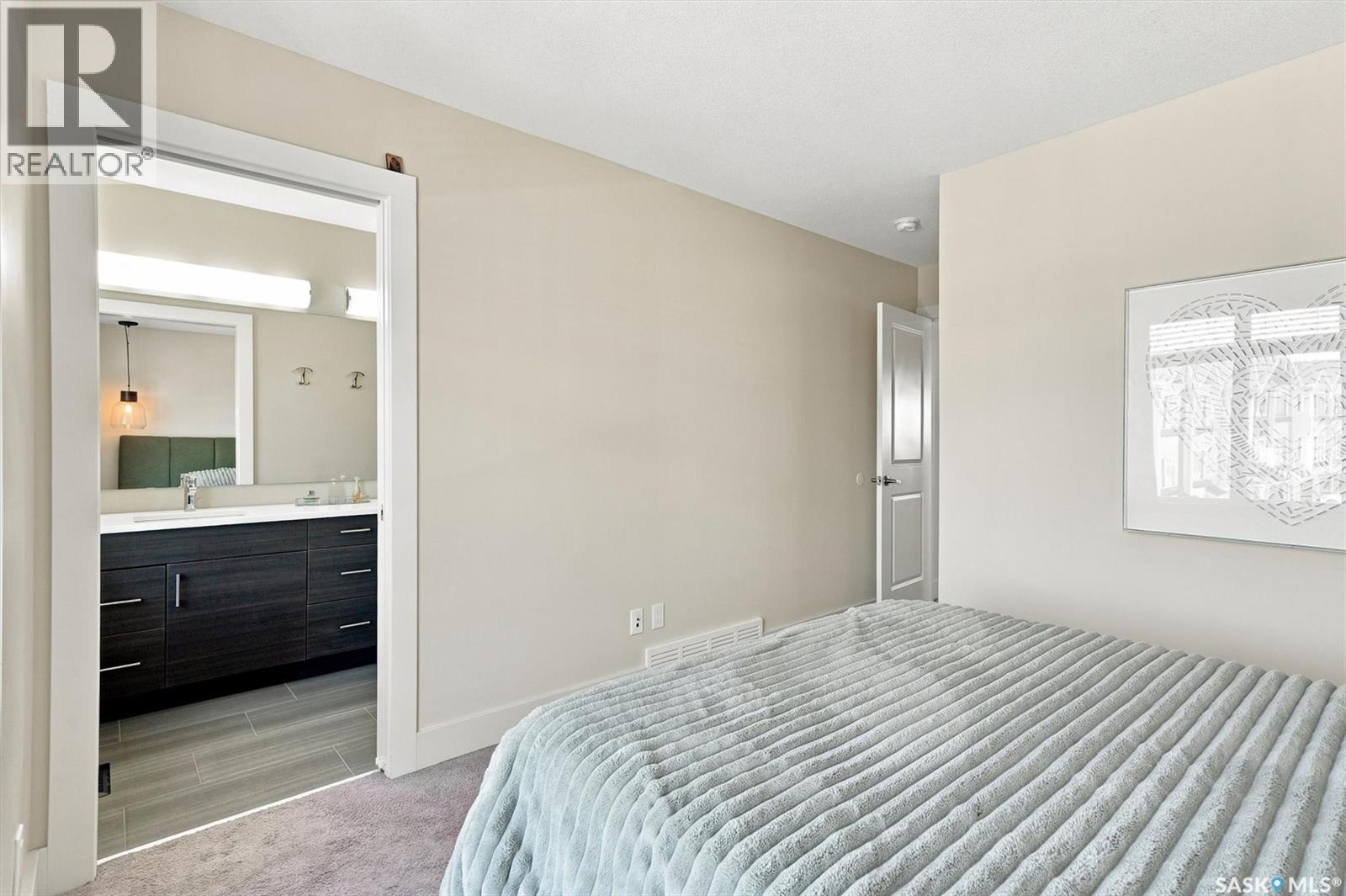 703 Meadows Boulevard, Saskatoon, SK - Indoor Photo Showing Bedroom