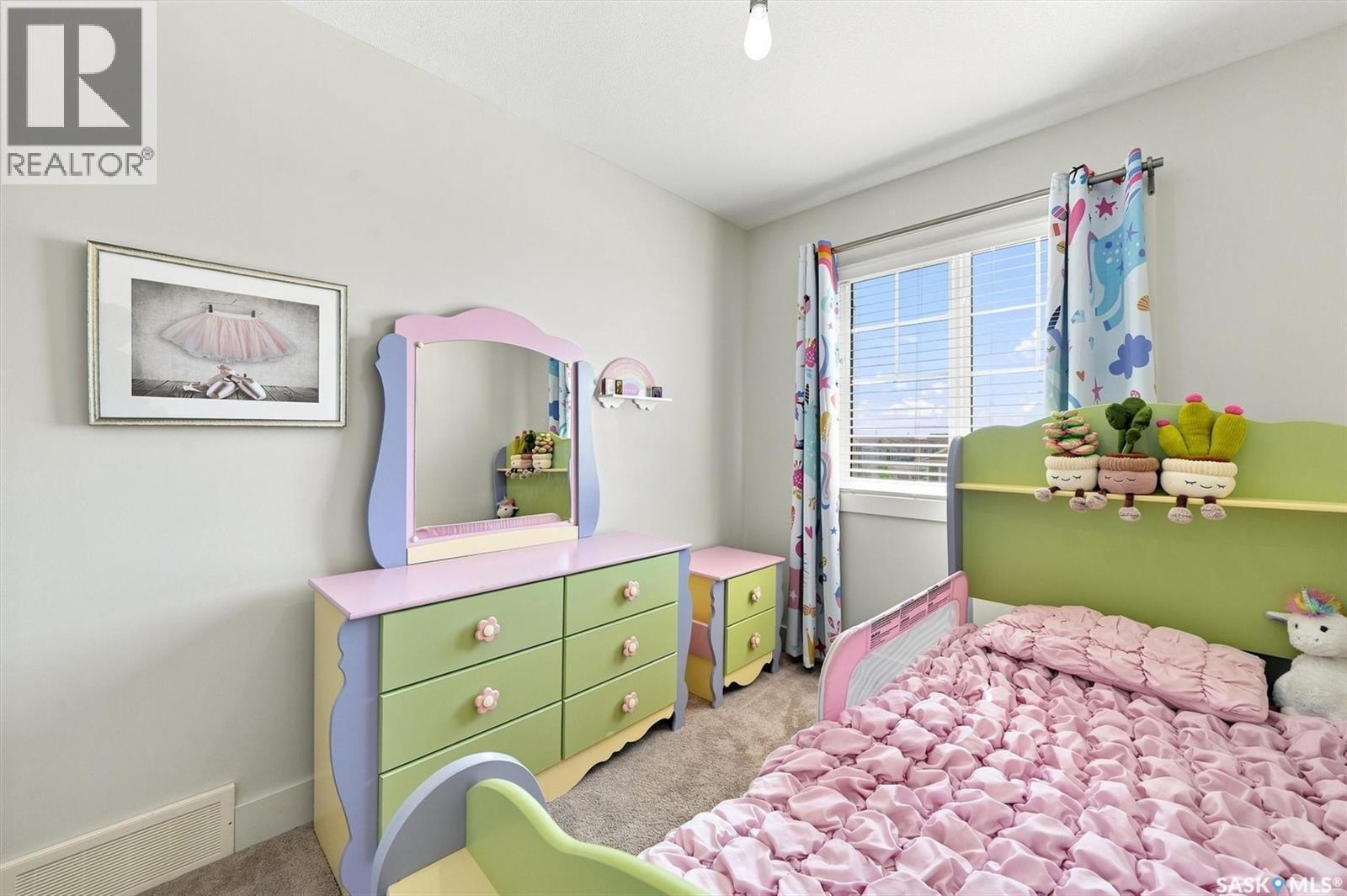703 Meadows Boulevard, Saskatoon, SK - Indoor Photo Showing Bedroom
