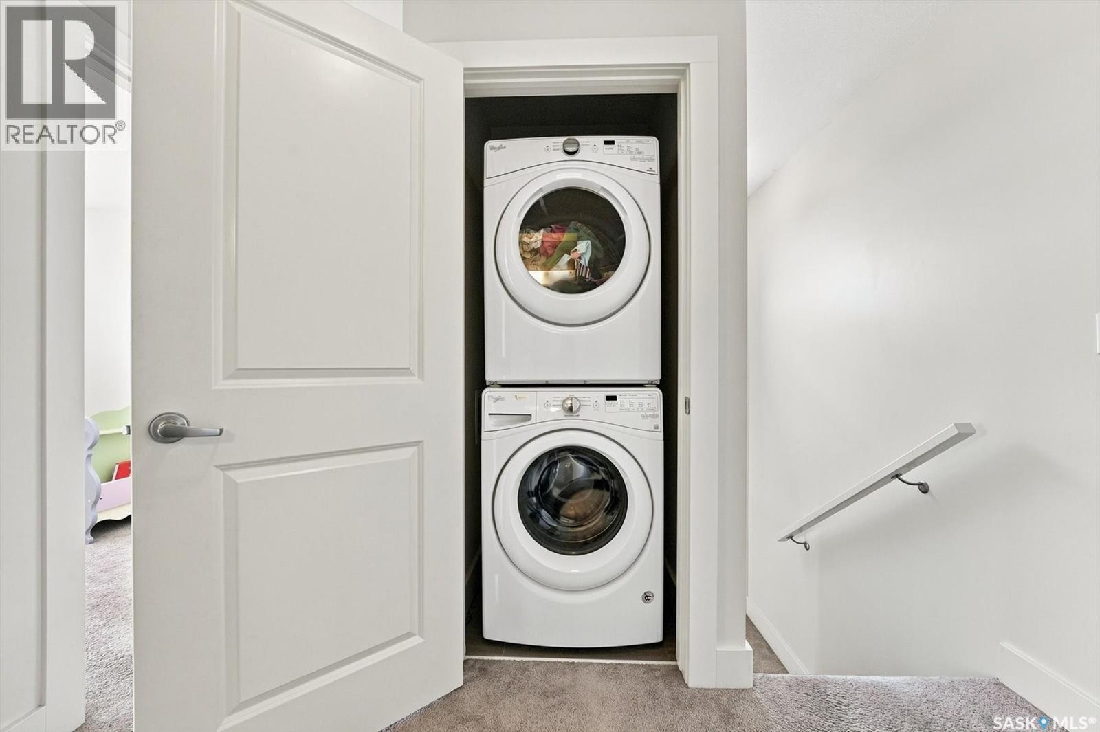 703 Meadows Boulevard, Saskatoon, SK - Indoor Photo Showing Laundry Room