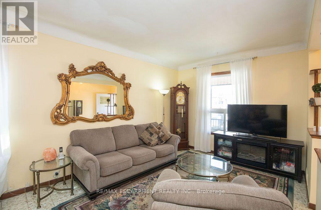 66 Sherman Avenue N, Hamilton, ON - Indoor Photo Showing Living Room With Fireplace