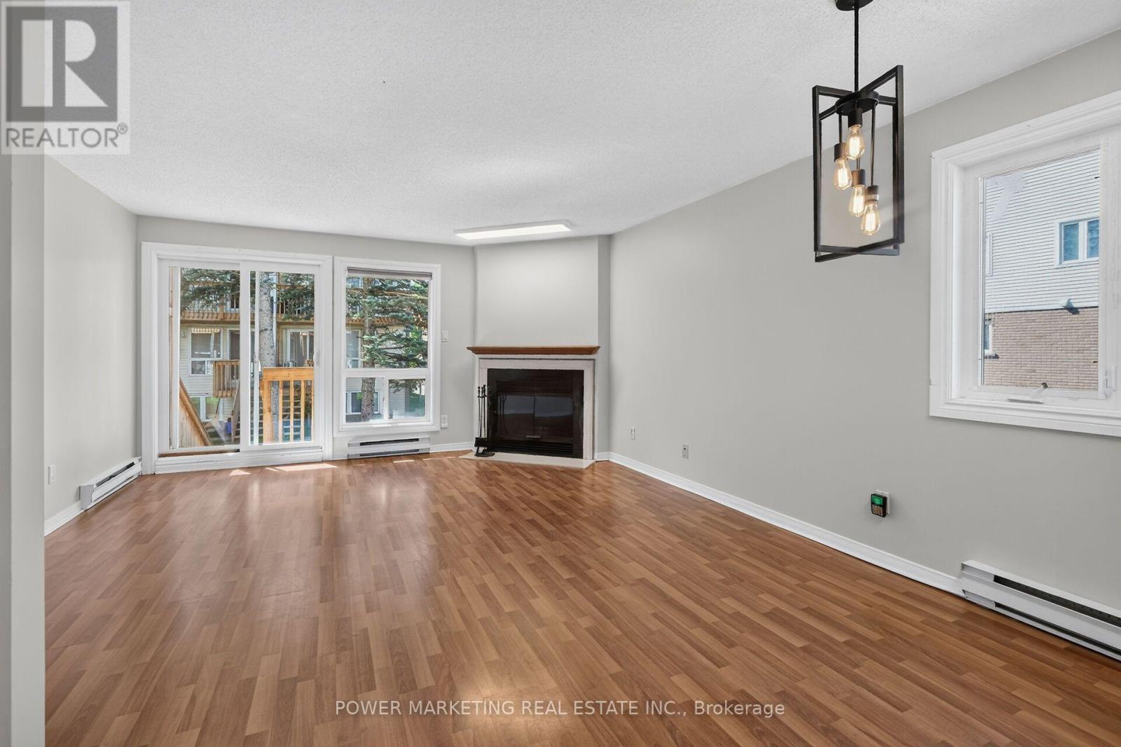 442 Briston Private, Ottawa, ON - Indoor Photo Showing Living Room With Fireplace