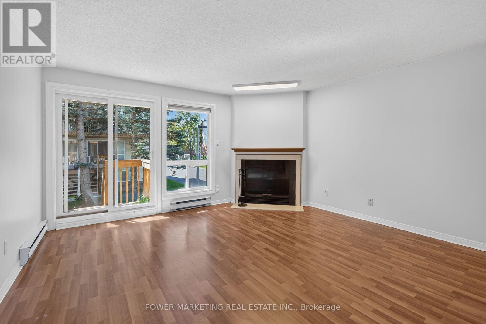 442 Briston Private, Ottawa, ON - Indoor Photo Showing Living Room With Fireplace