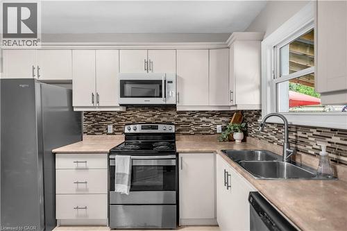31 Scotia Avenue, Hamilton, ON - Indoor Photo Showing Kitchen With Stainless Steel Kitchen With Double Sink