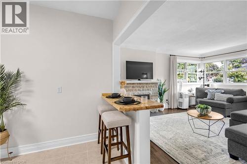 31 Scotia Avenue, Hamilton, ON - Indoor Photo Showing Living Room With Fireplace