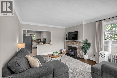 31 Scotia Avenue, Hamilton, ON - Indoor Photo Showing Living Room With Fireplace
