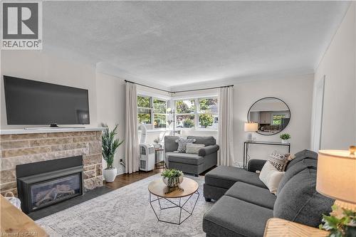31 Scotia Avenue, Hamilton, ON - Indoor Photo Showing Living Room With Fireplace