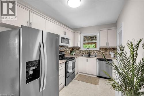 31 Scotia Avenue, Hamilton, ON - Indoor Photo Showing Kitchen With Stainless Steel Kitchen With Double Sink With Upgraded Kitchen