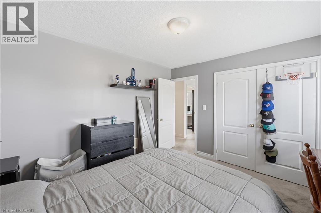 Neutral wall colors with white trim - 738 Fourth Line, Milton, ON - Indoor Photo Showing Bedroom