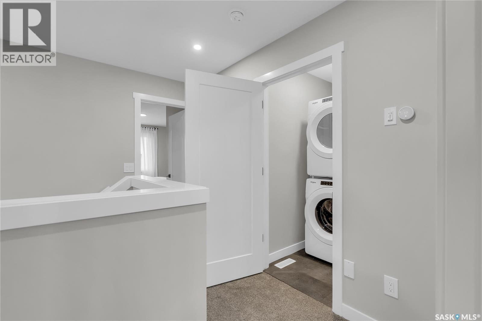 118 Amisk Way, Saskatoon, SK - Indoor Photo Showing Laundry Room