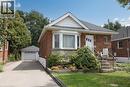 Brick exterior featuring a bay window, concrete front porch, and a dedicated driveway - 575 Upper Wentworth Street, Hamilton, ON  - Outdoor 