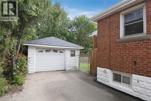 Detached garage with a paneled door - 575 Upper Wentworth Street, Hamilton, ON - Outdoor With Exterior