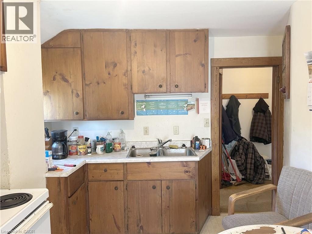 Upper unit - 100 Stanley Street, Simcoe, ON - Indoor Photo Showing Kitchen With Double Sink