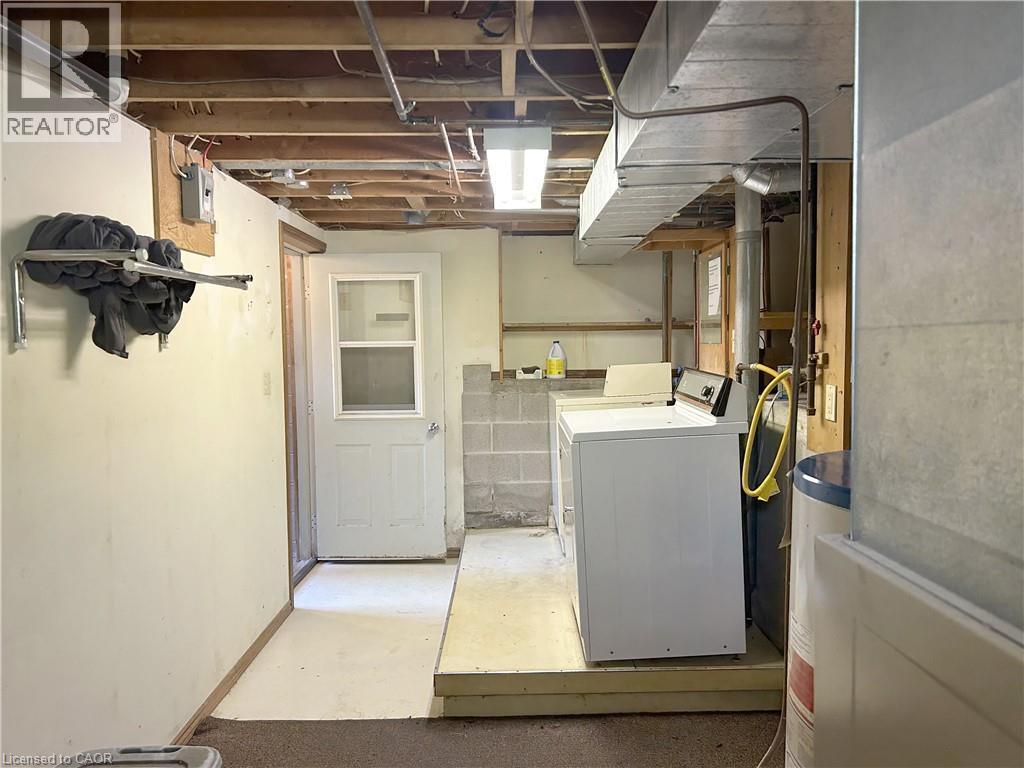 basement utility room - 100 Stanley Street, Simcoe, ON - Indoor Photo Showing Laundry Room
