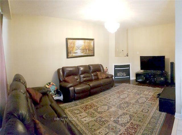 5641 Watersfield Avenue, Mississauga, ON - Indoor Photo Showing Living Room With Fireplace
