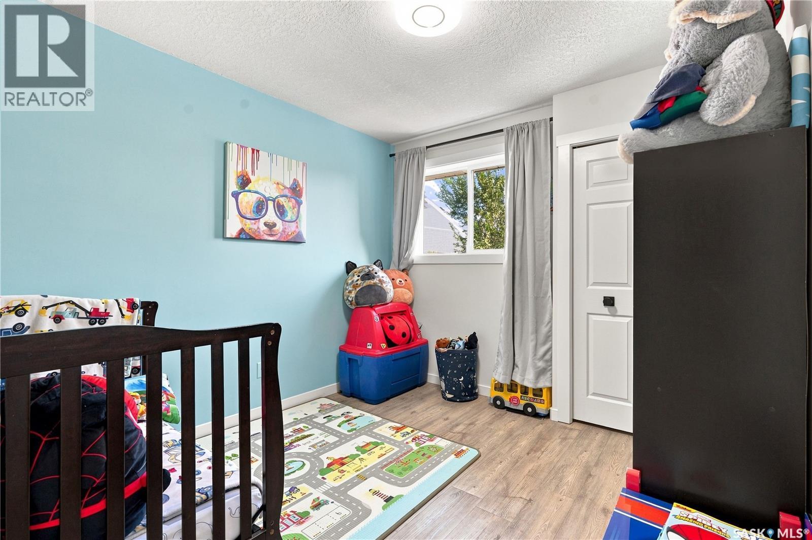 107 Hall Crescent, Saskatoon, SK - Indoor Photo Showing Bedroom