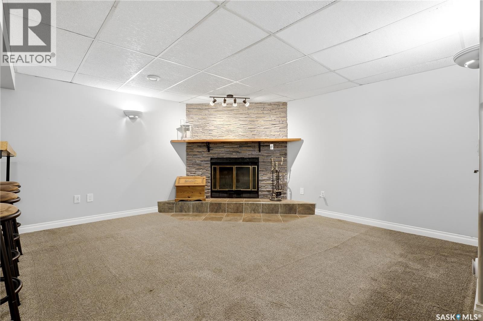 314 Howe Place, Regina, SK - Indoor Photo Showing Living Room With Fireplace