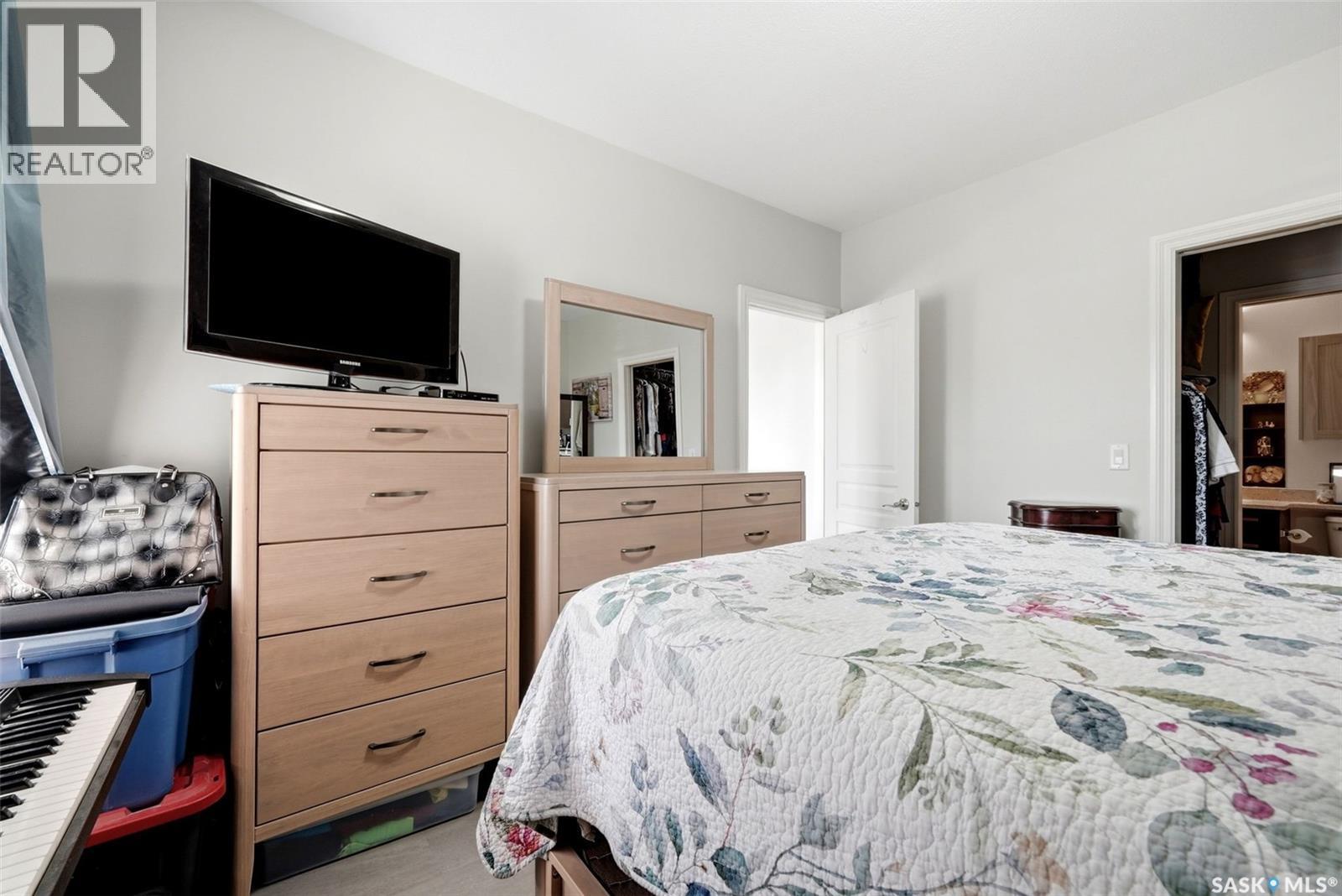 206 1715 Badham Boulevard, Regina, SK - Indoor Photo Showing Bedroom