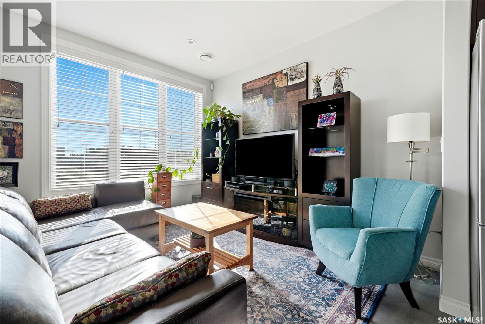206 1715 Badham Boulevard, Regina, SK - Indoor Photo Showing Living Room