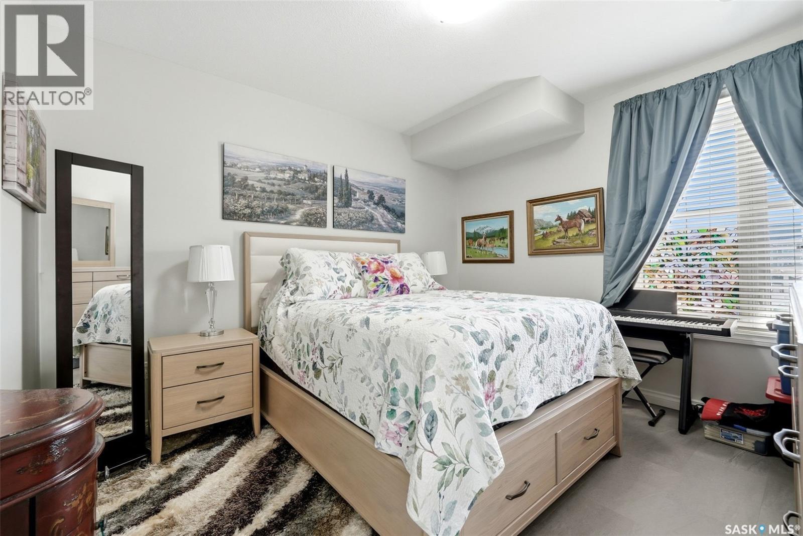 206 1715 Badham Boulevard, Regina, SK - Indoor Photo Showing Bedroom