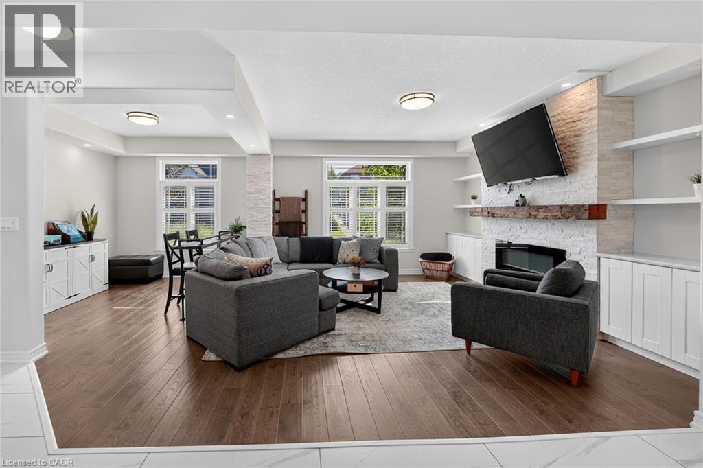 4079 Stadelbauer Drive, Beamsville, ON - Indoor Photo Showing Living Room With Fireplace