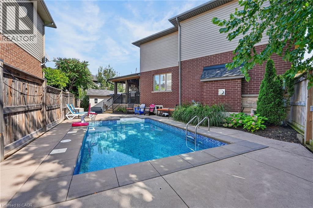 4079 Stadelbauer Drive, Beamsville, ON - Outdoor With In Ground Pool With Exterior