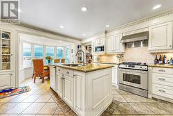 Traditional kitchen with stainless appliances - 
