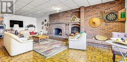 Lower level rec room with wood burning fireplace - 
