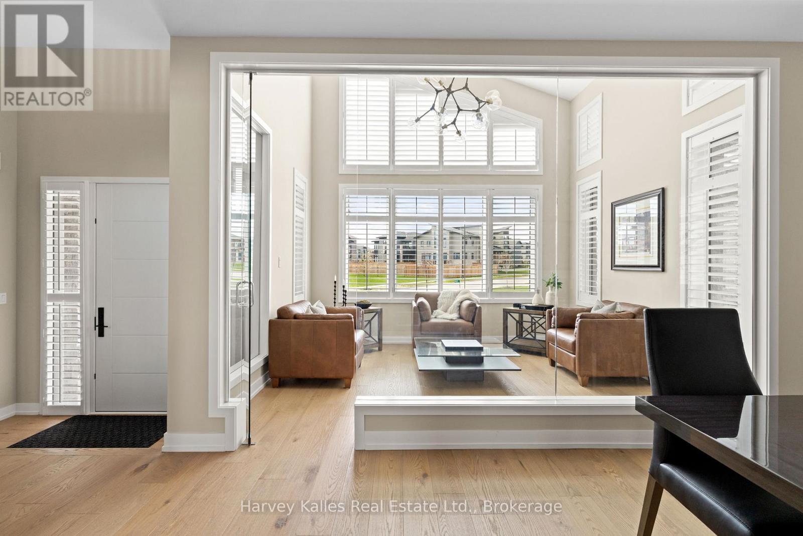 Glass enclosed wine tasting room/sitting room - 163 Springside Crescent, Blue Mountains, ON - Indoor Photo Showing Other Room