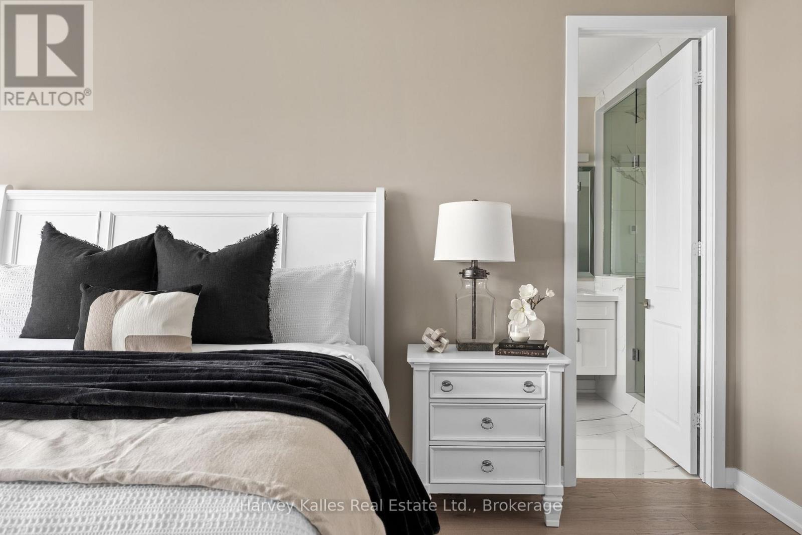 Primary bedroom to primary ensuite bathroom - 163 Springside Crescent, Blue Mountains, ON - Indoor Photo Showing Bedroom